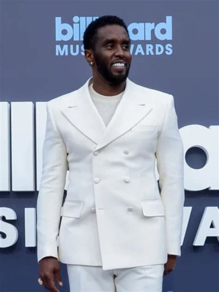 Unveiling Diddy in White Suit: A Fashion Icon's Statement